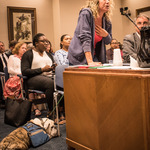  Caption: a supporter of the Confederate monuments bills who traveled from Florida / Credits: Photo by Robin May